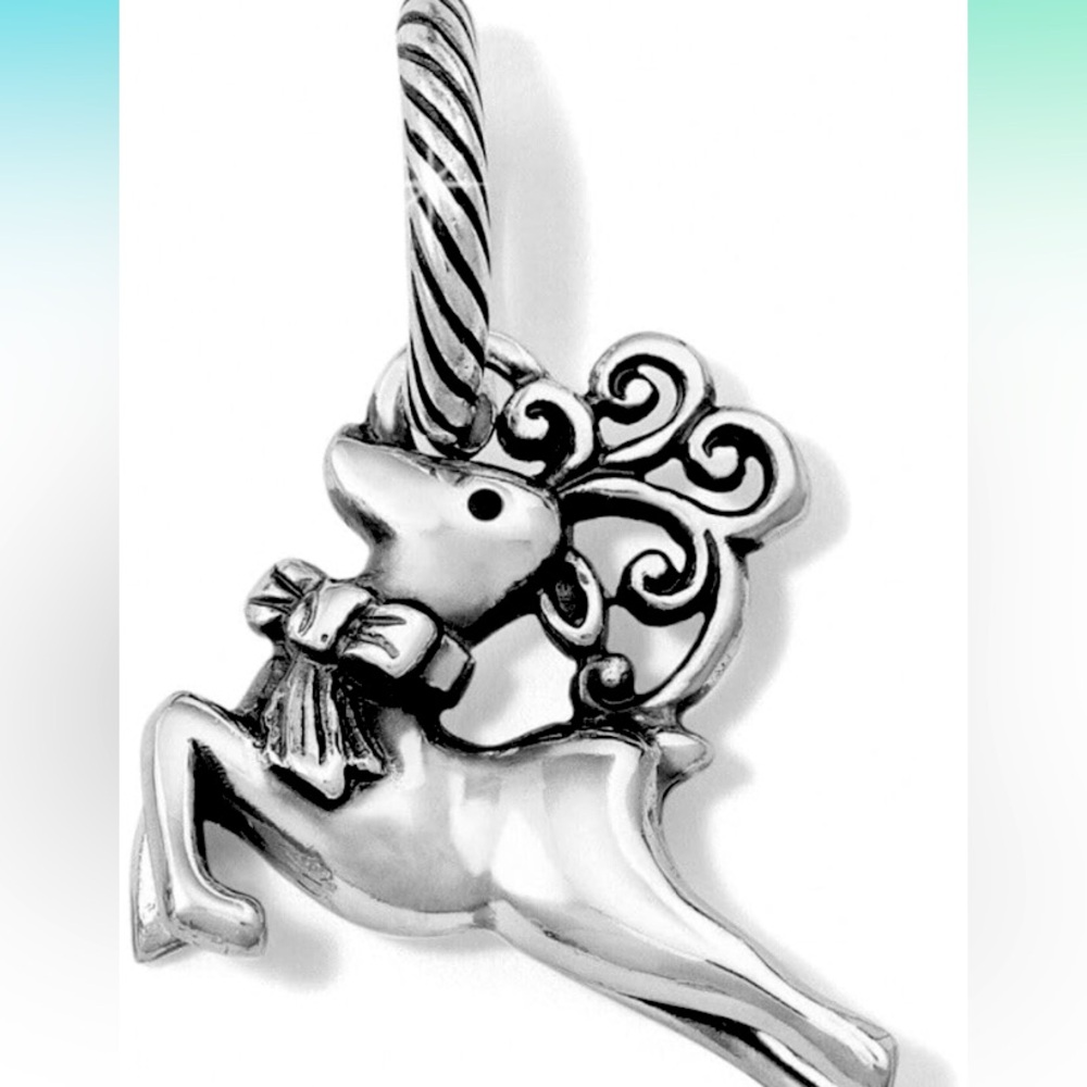 Brighton Dancer the reindeer comes with chain. Used twice.